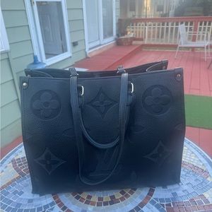 Louis Vuitton Black Monogram Empreinte Giant
Onthego GM